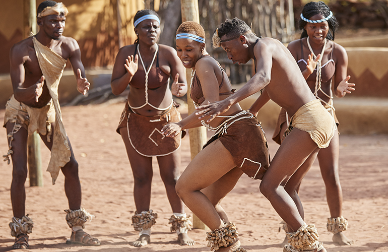 Performers undertake a traditional dance at the Gabane cultural village in Botswana