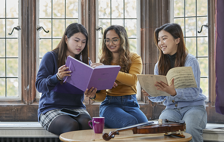 Durham Univeritry music students discuss their assignment