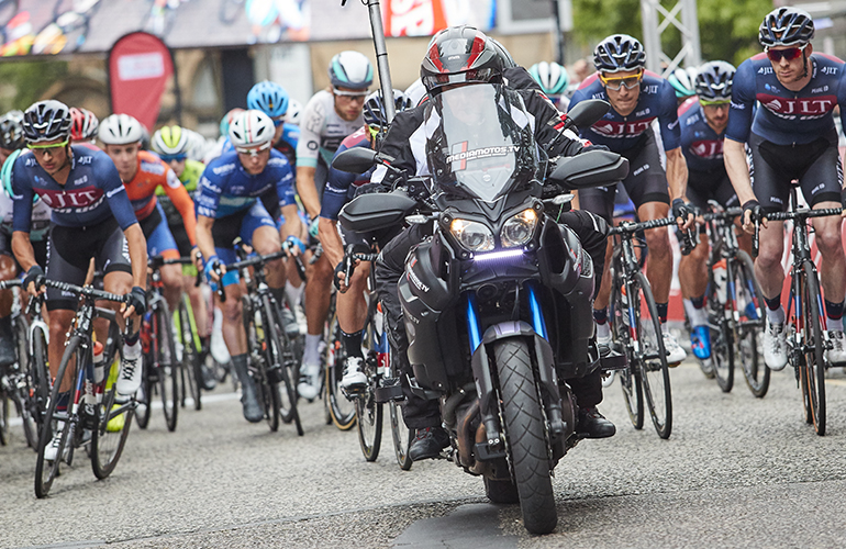 Cyclists depart on the opening lap of the Sheffield Grand Prix