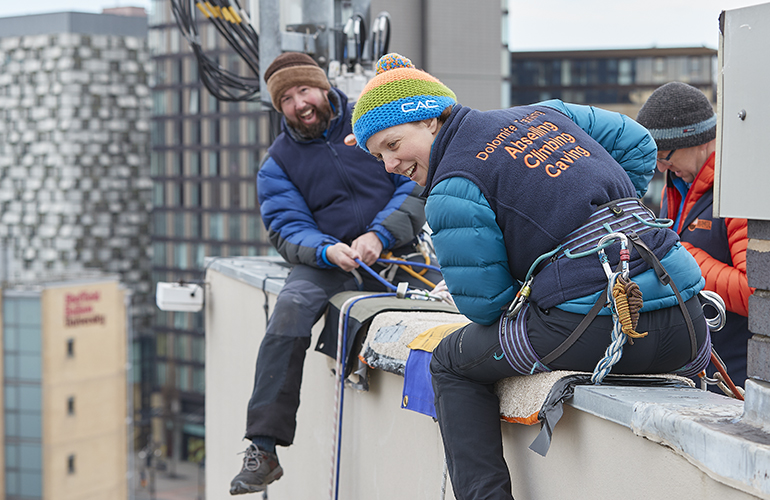 Dolomite training assist with a charity abseil at Sheffield Hallam University